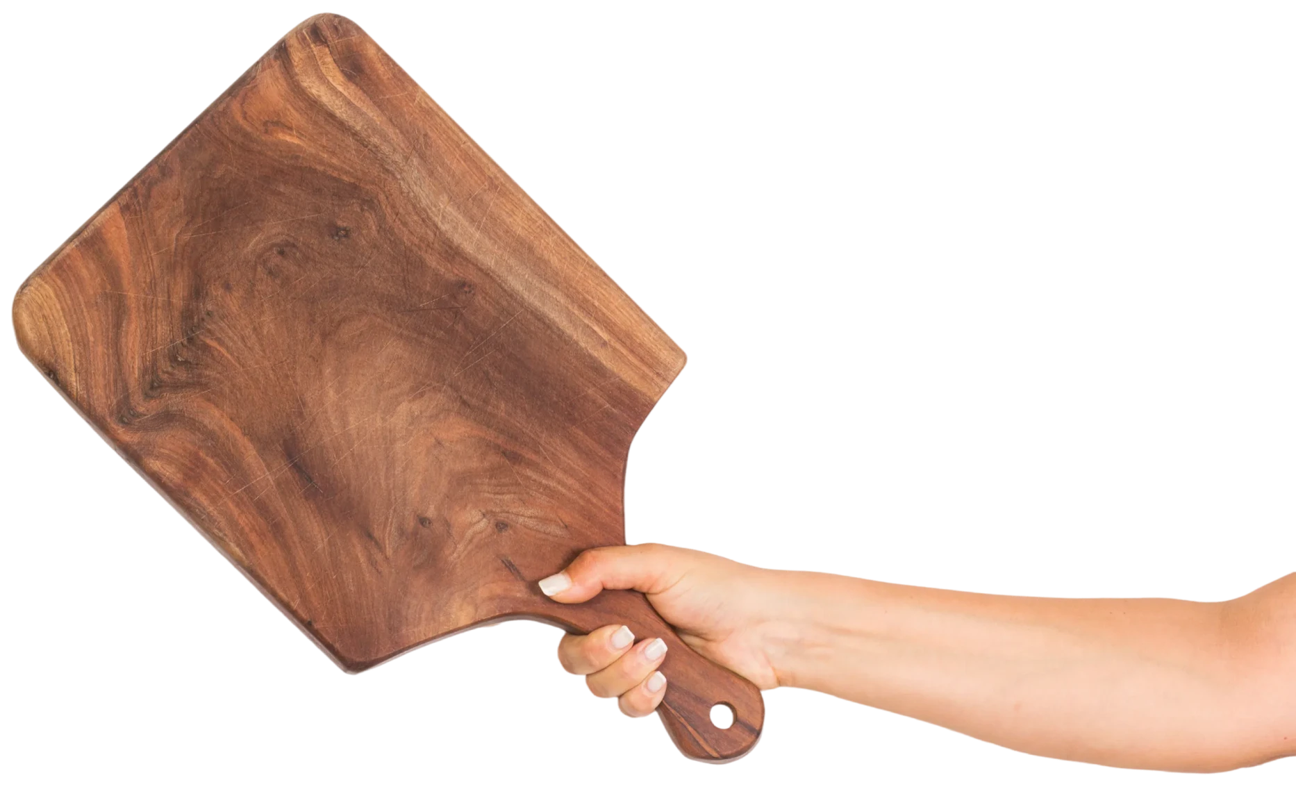 Hand holding a wooden cutting board
